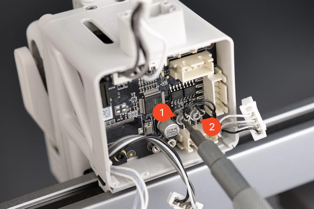 image_006_remove_the_eddy_sensor_screws.jpeg