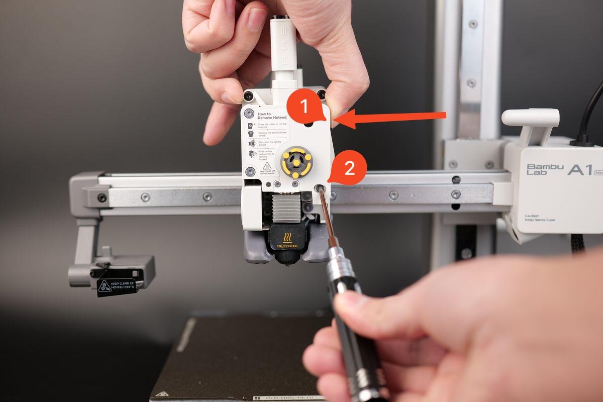 image_008_press_cutter_lever_and_remove_screw.jpeg
